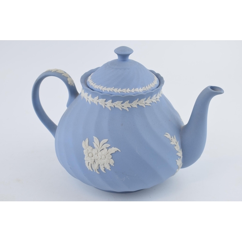 274A - Wedgwood Blue Jasperware teapot with floral relief, ribbed effect.