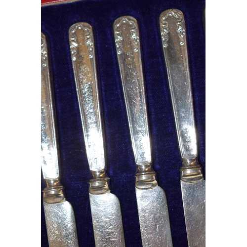 276 - A collection of metalware to include 2 cased sets of 6 silver handled knives, with silver plated cut... 