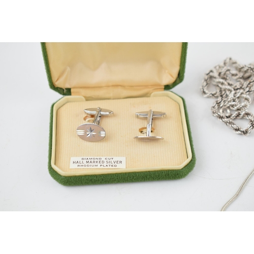 282 - A collection of silver items to include a boxed pair of cufflinks, a sterling silver heart shaped lo... 