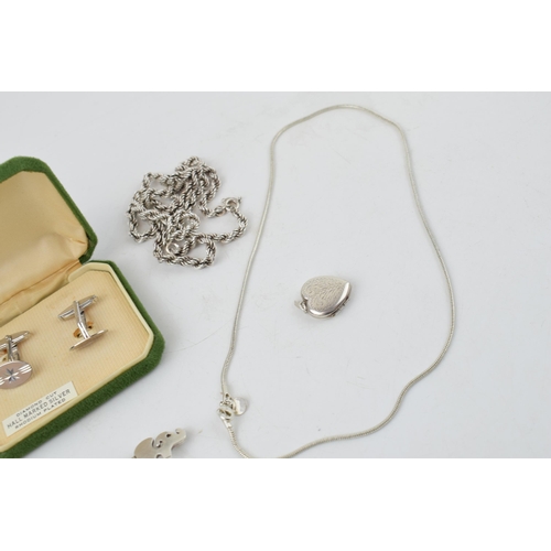 282 - A collection of silver items to include a boxed pair of cufflinks, a sterling silver heart shaped lo... 