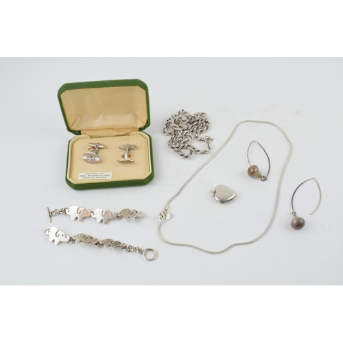 282 - A collection of silver items to include a boxed pair of cufflinks, a sterling silver heart shaped lo... 