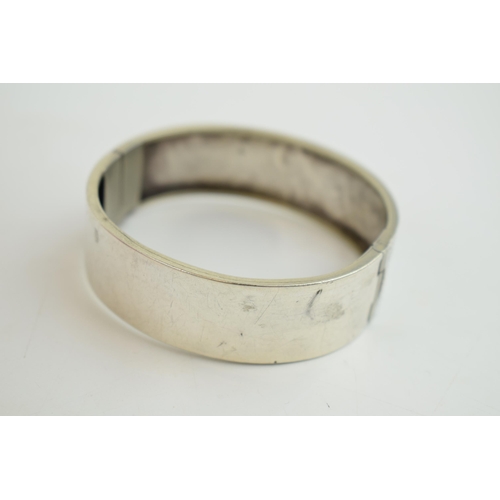 292 - Wide silver bangle, 18.3 grams, no hallmarks.