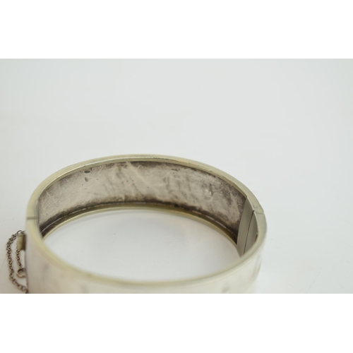 292 - Wide silver bangle, 18.3 grams, no hallmarks.