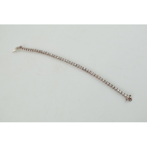 293 - Sterling silver tennis bracelet set with CZs, 12.2 grams, 20.5cm.