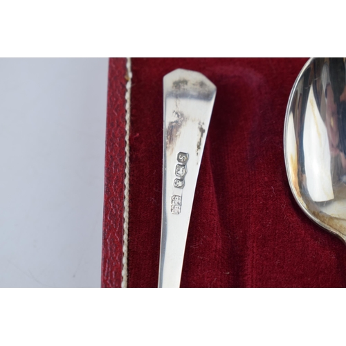 294 - A boxed set of silver spoons hallmarked Sheffield 1935. In red velvet lined case. Weight 72 grams.