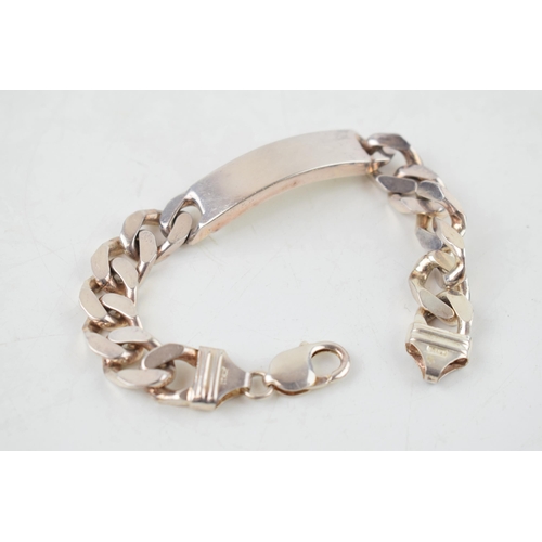 306 - Silver ID bracelet with vacant plaque, 20cm long, 59.5 grams.