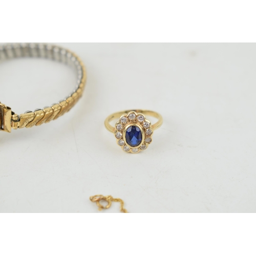 313 - A collection of 9ct gold items to include a ladies ring set with a central sapphire, a rope chain, a... 