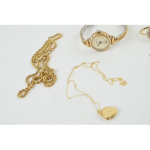 313 - A collection of 9ct gold items to include a ladies ring set with a central sapphire, a rope chain, a... 