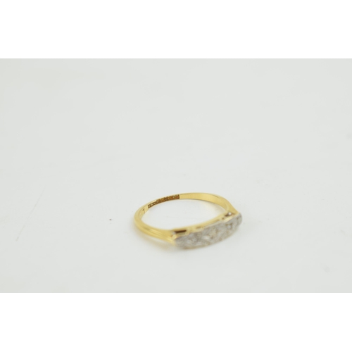 314 - An 18ct yellow gold ring (size k) set with diamonds. Weight 1.8 grams.