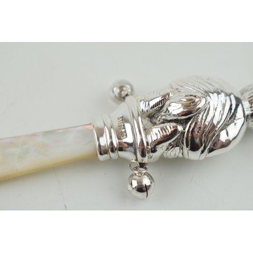 326 - Sterling silver baby rattle, with mother of pearl, in the form of a Beatrix Potter style character, ... 