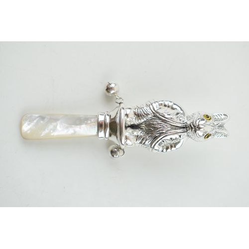 326 - Sterling silver baby rattle, with mother of pearl, in the form of a Beatrix Potter style character, ... 