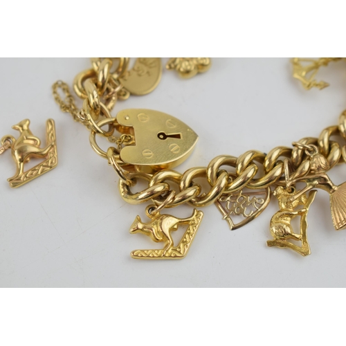 331 - 9ct yellow gold charm bracelet with padlock clasp and safety chain. To include 14 individual charms ... 