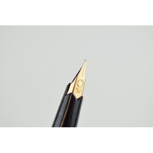 405 - A vintage Montblanc fountain pen with 14k gold nib made in W Germany.  Length 13cm.