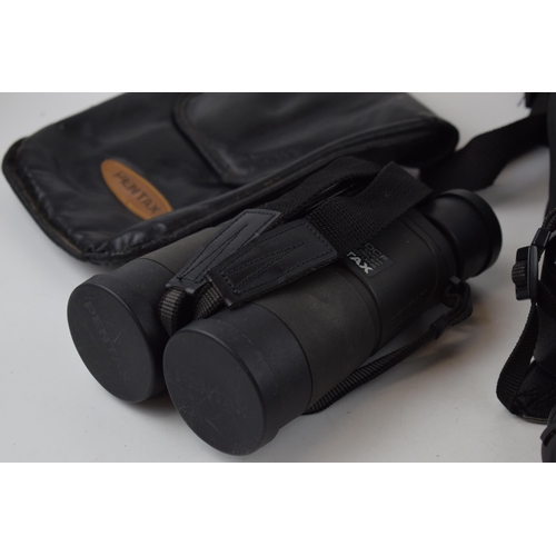 409 - A pair of Pentax 8 x 42 DCF 6.2 108m / 1000m 17mm Eye Relief, multi coated lens PENTAX binoculars in... 