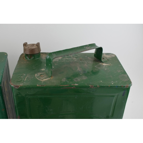 416 - Automobilia to include 2 Esso petrol cans, 1 re-painted, with a pair of vintage battery chargers (4)... 