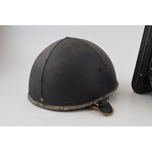 418 - A Slazenger Made in England Motorcycle helmet together with a vintage Kodak camera. (2)