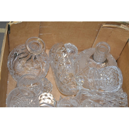 424 - A good collection of cut glass and crystal items to include decanters, jugs, bowls and others (Qty -... 