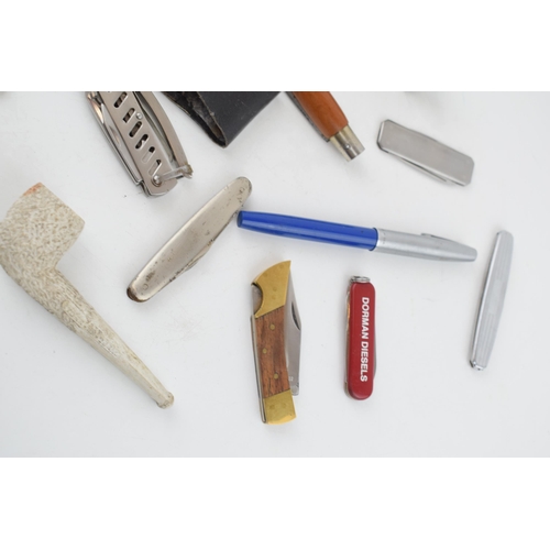 473 - A collection of vintage penknives to include examples by Victorinox, together with a collection of v... 