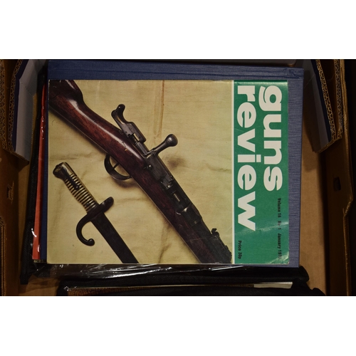 582 - Guns and Review bound magazine editions from the 1960s and 1970s. Large quantity in two trays.