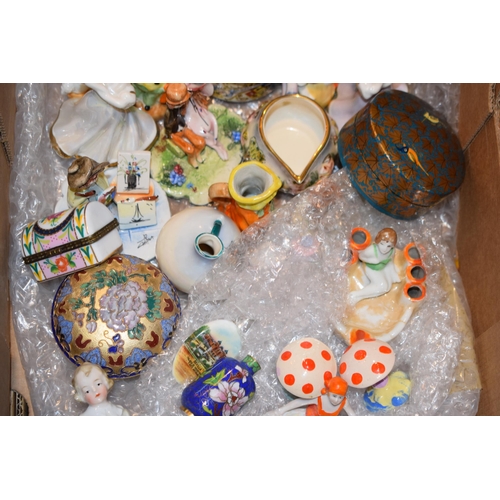 63 - A collection of pottery items and collectables to include studio pottery figures, toadstools, vintag... 