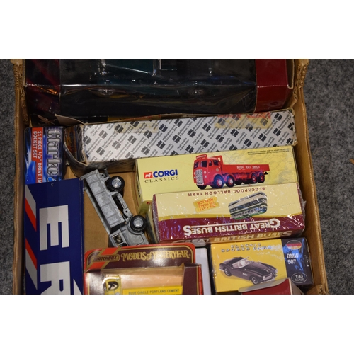 634 - A collection of boxed die-cast vehicles to include Corgi Classics, Matchbox Models of Yesteryear, Co... 