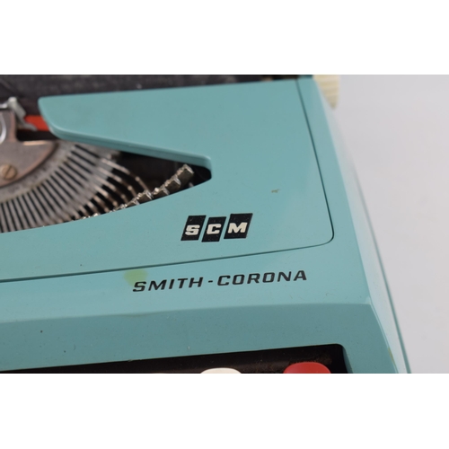 445 - Vintage Smith - Corona SCM 'Corsair' Typewriter in duck egg blue finish with original outer case. Wi... 