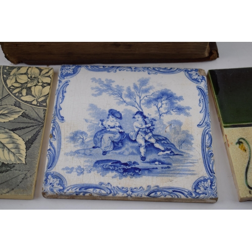 459 - An interesting collection of items to include 3 Victorian tiles, one by Smith and Co of Coalville, a... 