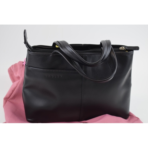 478 - Radley real leather handbag, black and grey with yellow piping in original pink cloth bag. 23cm x 28... 