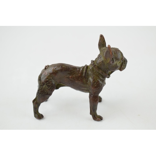 485 - A contemporary bronzed sculpture of a bulldog standing four square, 7cm long.