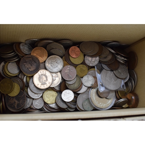 488 - Coins to include a boxed 1985 United Kingdom boxed proof set, 200+ 3 pence pieces, a UK uncirculated... 