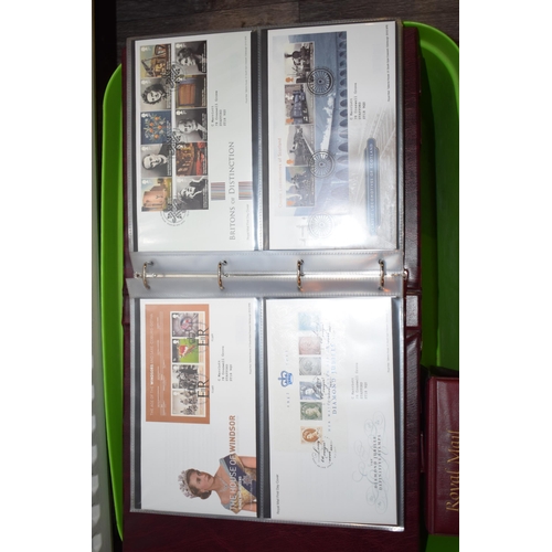 497 - A large and extensive collection of Royal Mail First Day Covers, in red leather bound albums, to inc... 