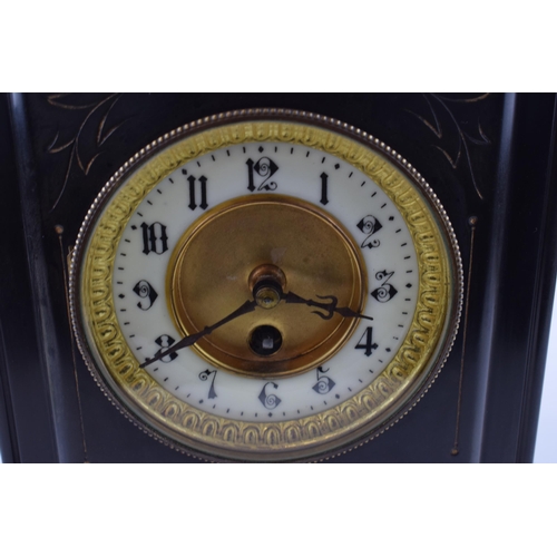 506 - A slate mantle pendulum clock. Ceramic dial on brass with gilt edging. Stylised floral gilt decorati... 