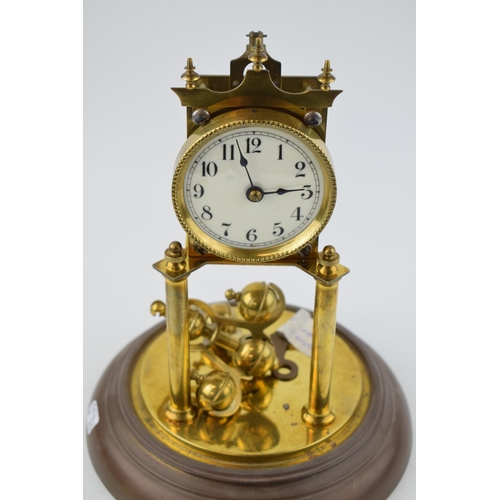 507 - Early 20th century Anniversary Clock on brass base. Height 31cm.