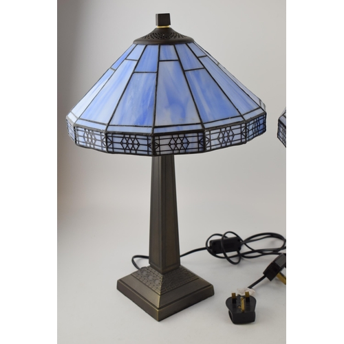 513 - A pair of Art Deco style bead-side lamps with blue glass Tiffany style shades. Modern wiring with sw... 