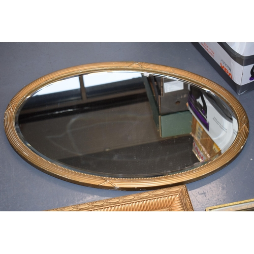 514 - 3 gilt framed antique mirrors with bevelled glass. To include a rectangular example with classical s... 