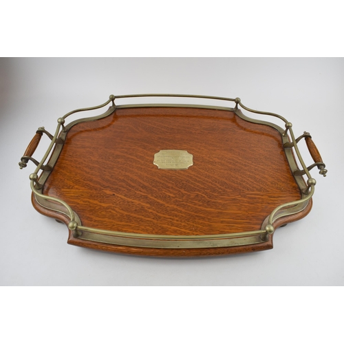 515 - Golden oak tea-tray with silver-plated rail and handles. Sitting on original ball feet. Silver-plate... 