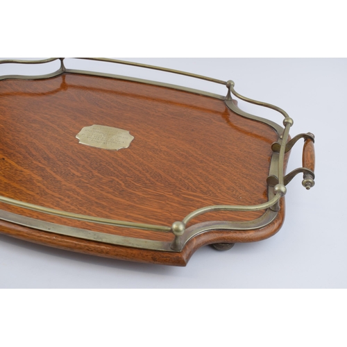 515 - Golden oak tea-tray with silver-plated rail and handles. Sitting on original ball feet. Silver-plate... 