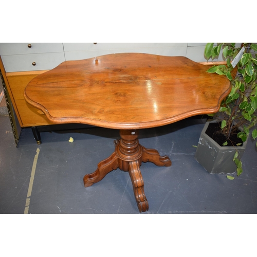 516 - 19th century French Walnut occasional table sitting on four legs. 102cm x 66cm height 73cm.