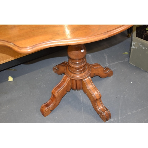 516 - 19th century French Walnut occasional table sitting on four legs. 102cm x 66cm height 73cm.