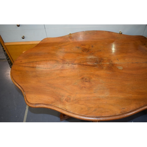 516 - 19th century French Walnut occasional table sitting on four legs. 102cm x 66cm height 73cm.