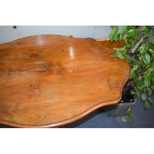 516 - 19th century French Walnut occasional table sitting on four legs. 102cm x 66cm height 73cm.