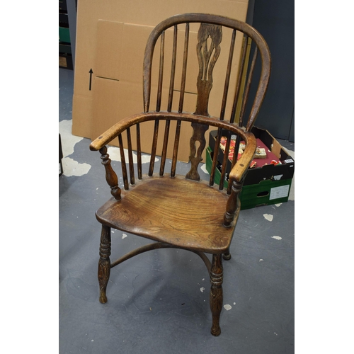 522 - Early Victorian elm and ash windsor chair, spindle back, shaped saddle seat, 98cm tall.