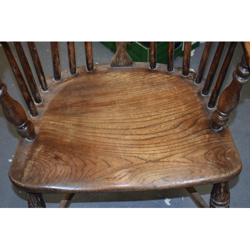 522 - Early Victorian elm and ash windsor chair, spindle back, shaped saddle seat, 98cm tall.