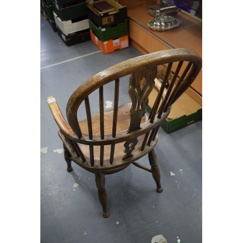 522 - Early Victorian elm and ash windsor chair, spindle back, shaped saddle seat, 98cm tall.