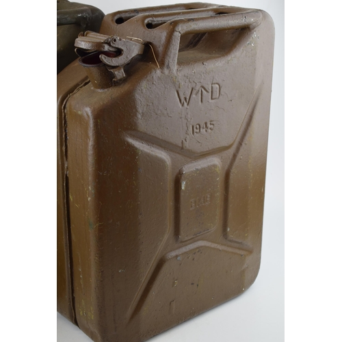 559 - A pair of World War Two British Army jerry cans, both dated 1945, 46cm tall (2).