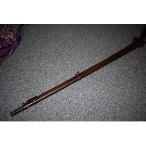 560 - Antique percussion musket with working action, obsolete calibre, 141cm long, collection only.