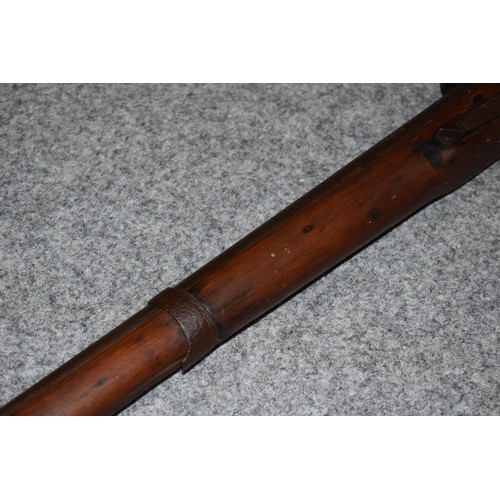 560 - Antique percussion musket with working action, obsolete calibre, 141cm long, collection only.