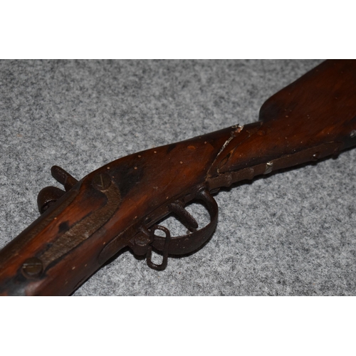 560 - Antique percussion musket with working action, obsolete calibre, 141cm long, collection only.