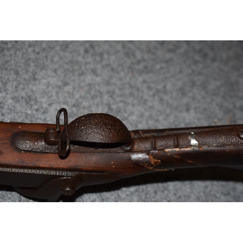 560 - Antique percussion musket with working action, obsolete calibre, 141cm long, collection only.