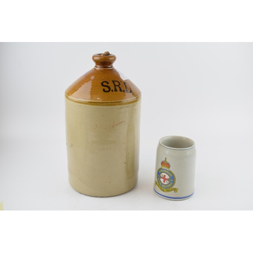 562 - A British Army rum ration SRD stoneware flagon, dated 1945, with a RAF pottery mug with King's Crown... 